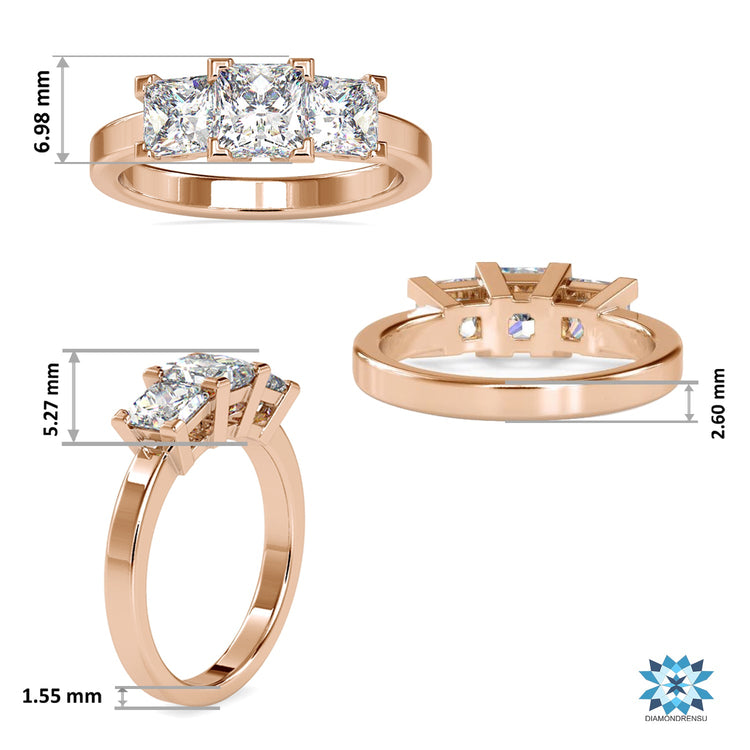 Rose gold engagement ring with three princess cut diamonds.
