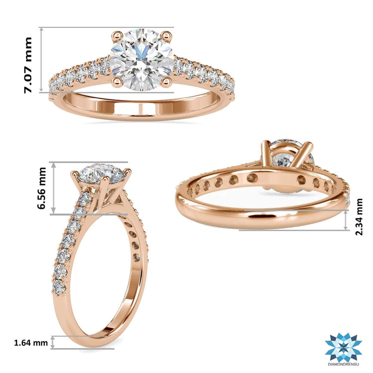 Rose gold ring with round cut lab diamond and four prong setting.
