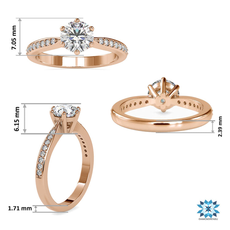 Rose gold engagement ring with round cut pave band design.
