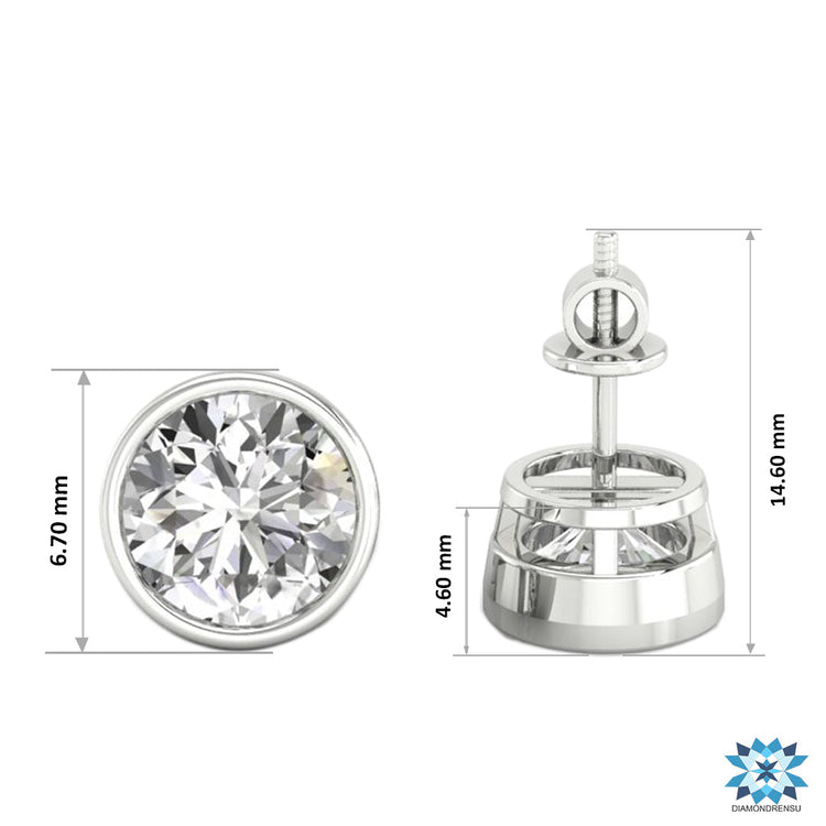Lab grown round diamond earrings in bezel set gold studs.
