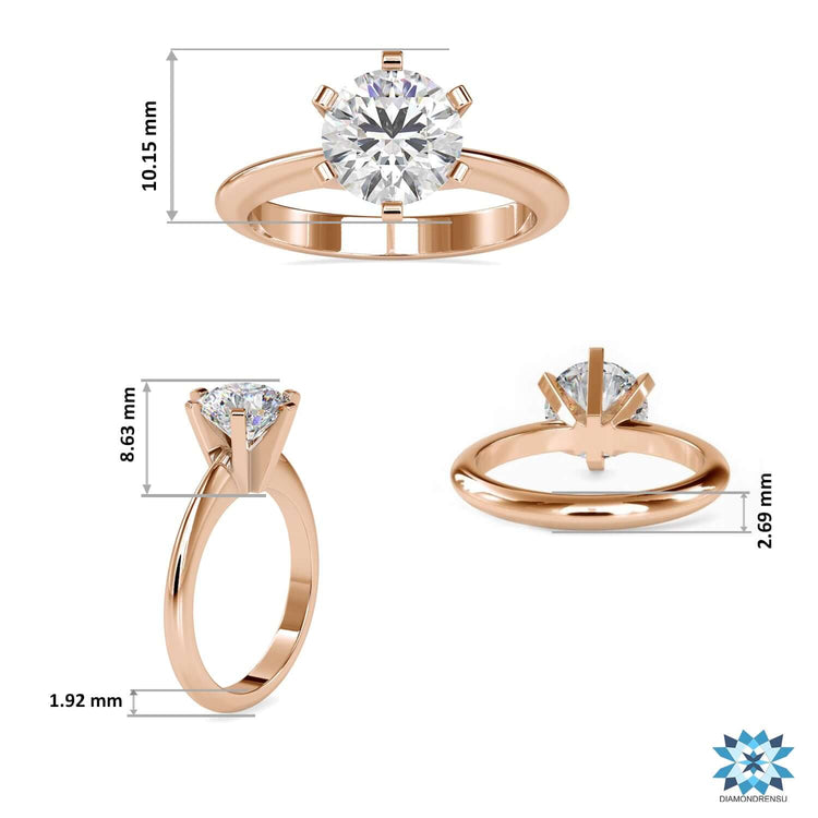 Six prong solitaire engagement ring in rose gold setting.
