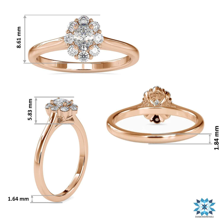 Lab grown oval diamond ring with halo and round side stones.
