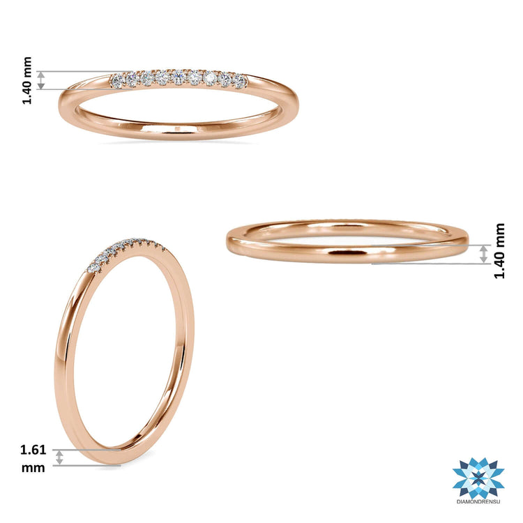 Rose gold wedding band with handmade lab grown diamonds.
