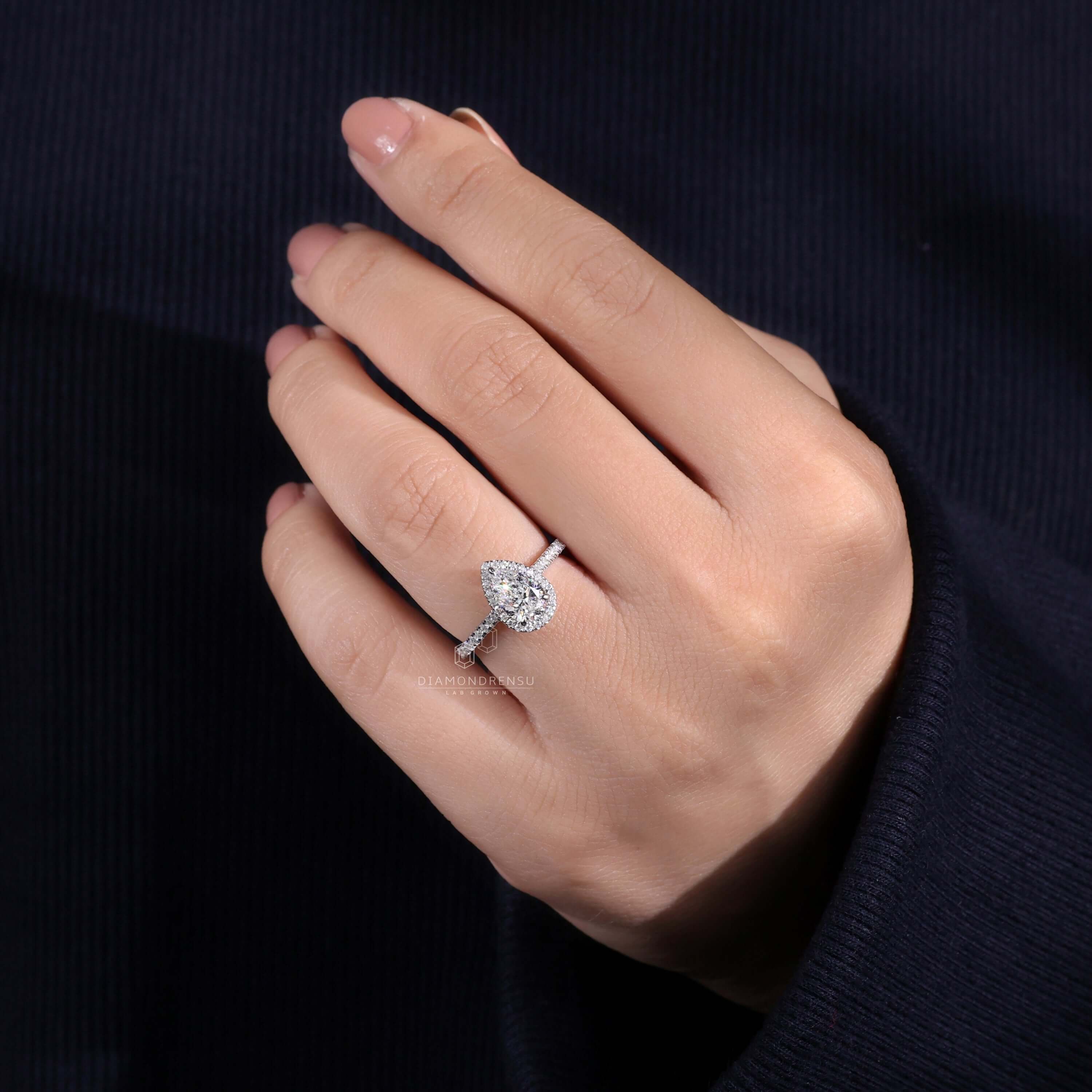 Stunning engagement pear shaped ring for a timeless look.