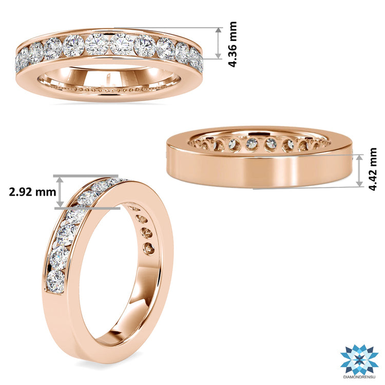 Rose gold wedding band featuring round cut diamonds.
