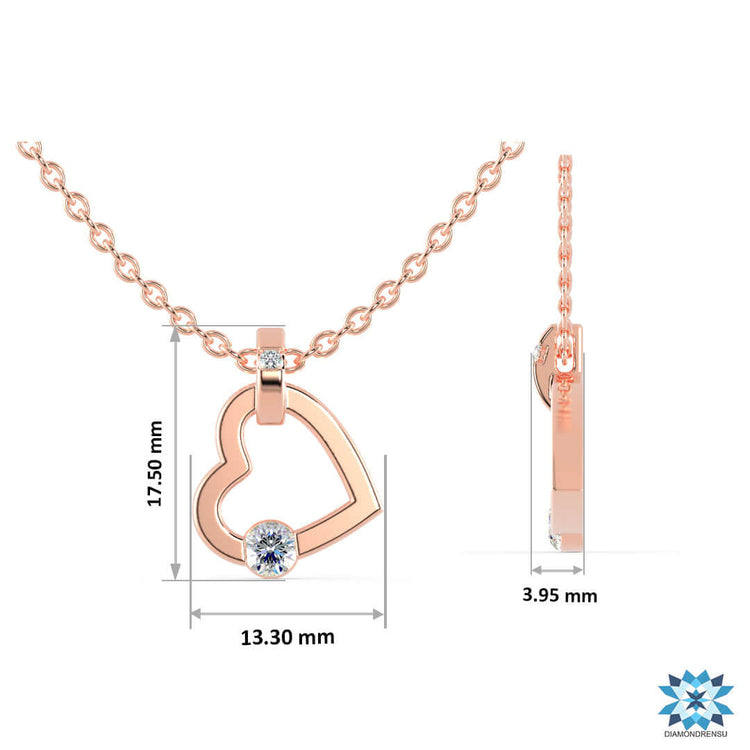 Handmade pendant featuring round diamond in heart design.
