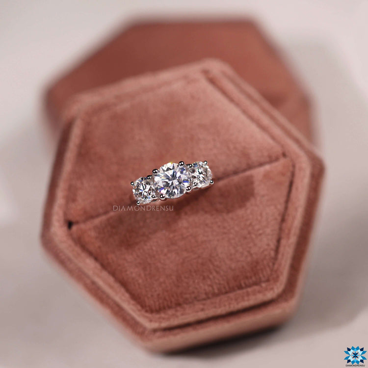 Handmade round cut moissanite ring with prong setting.
