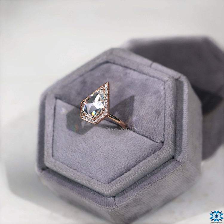 Handmade pear rose cut moissanite ring.
