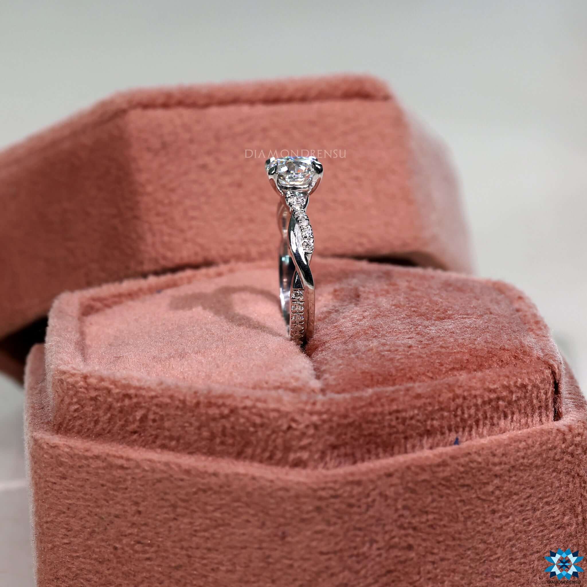 Pave setting ring with a beautiful white gold moissanite ring band.