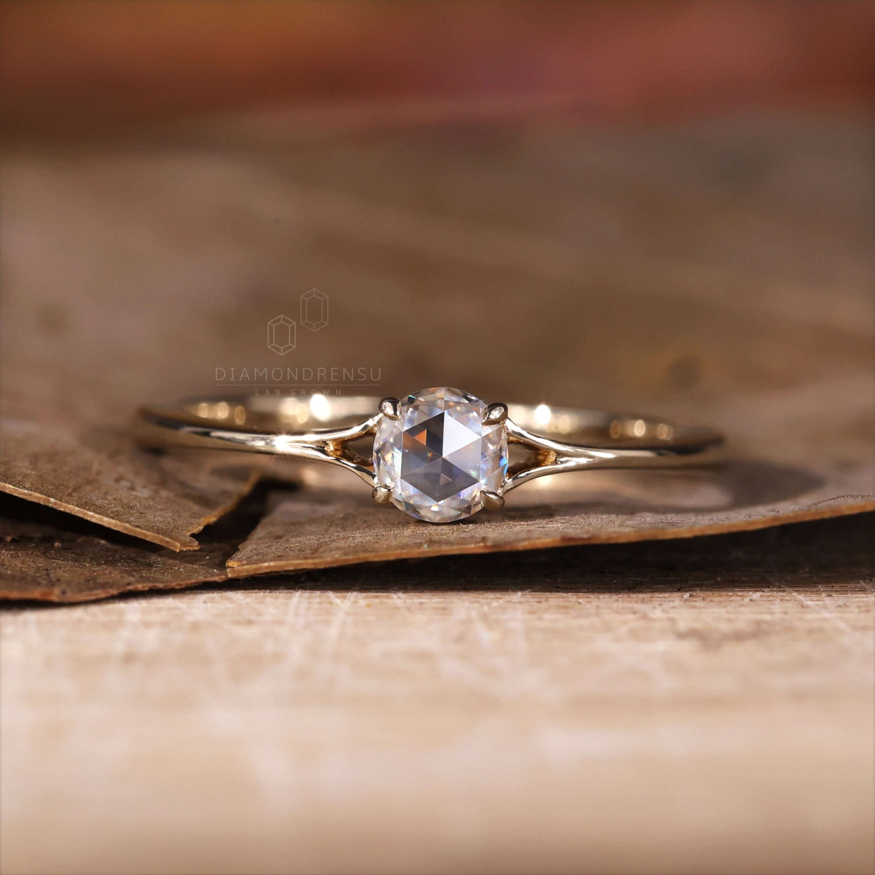 Split band engagement ring with a claw prong setting for beauty
