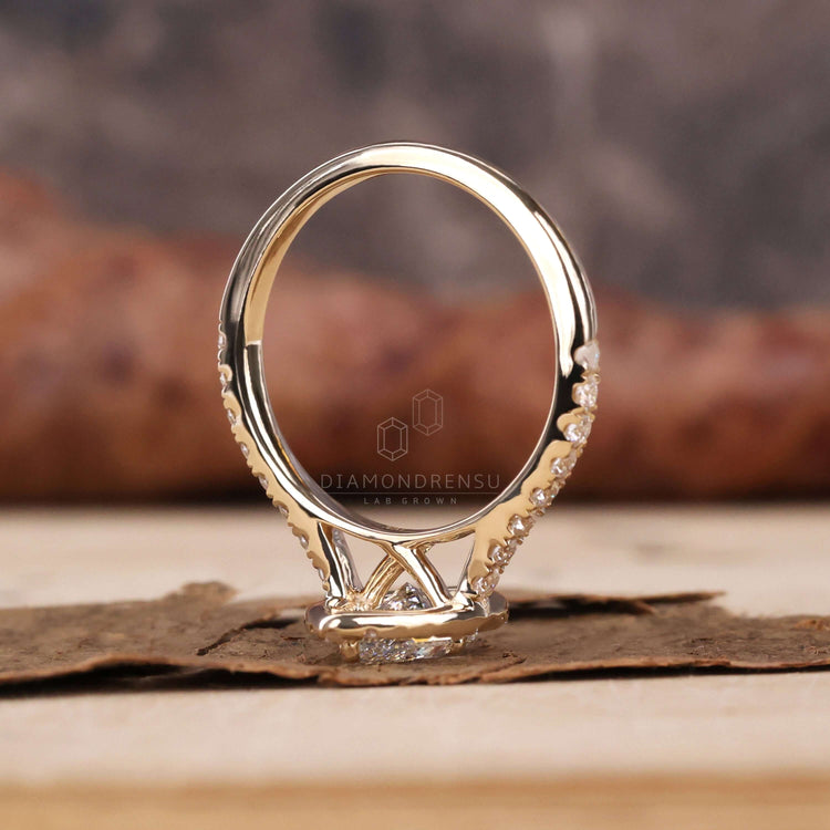 Halo diamond ring showcasing a unique prong setting design
