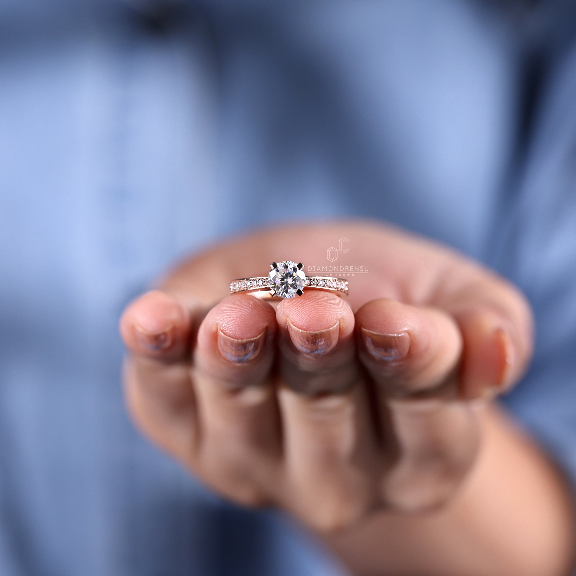 Round pave ring featuring diamondrensu uk craftsmanship.