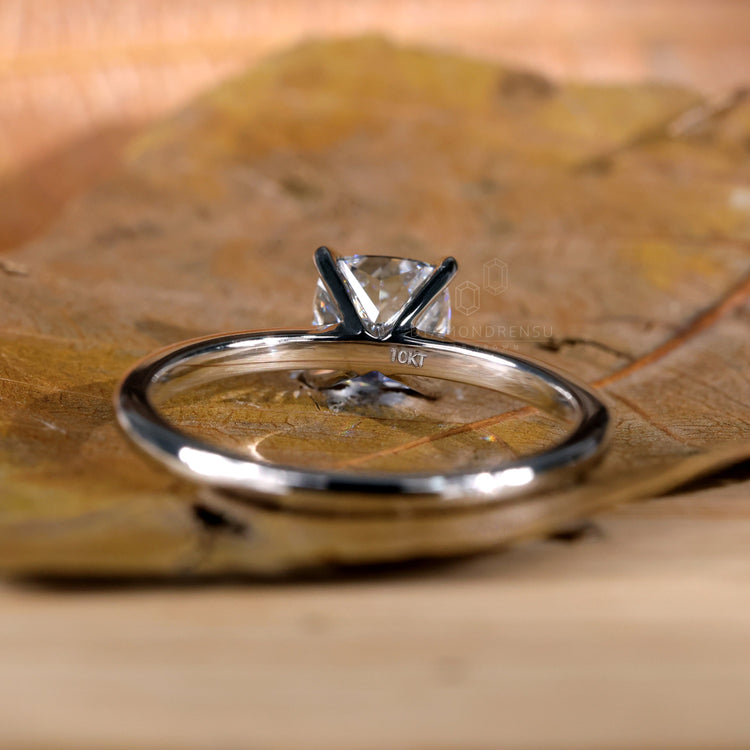 Cushion cut solitaire diamond ring crafted for perfection.