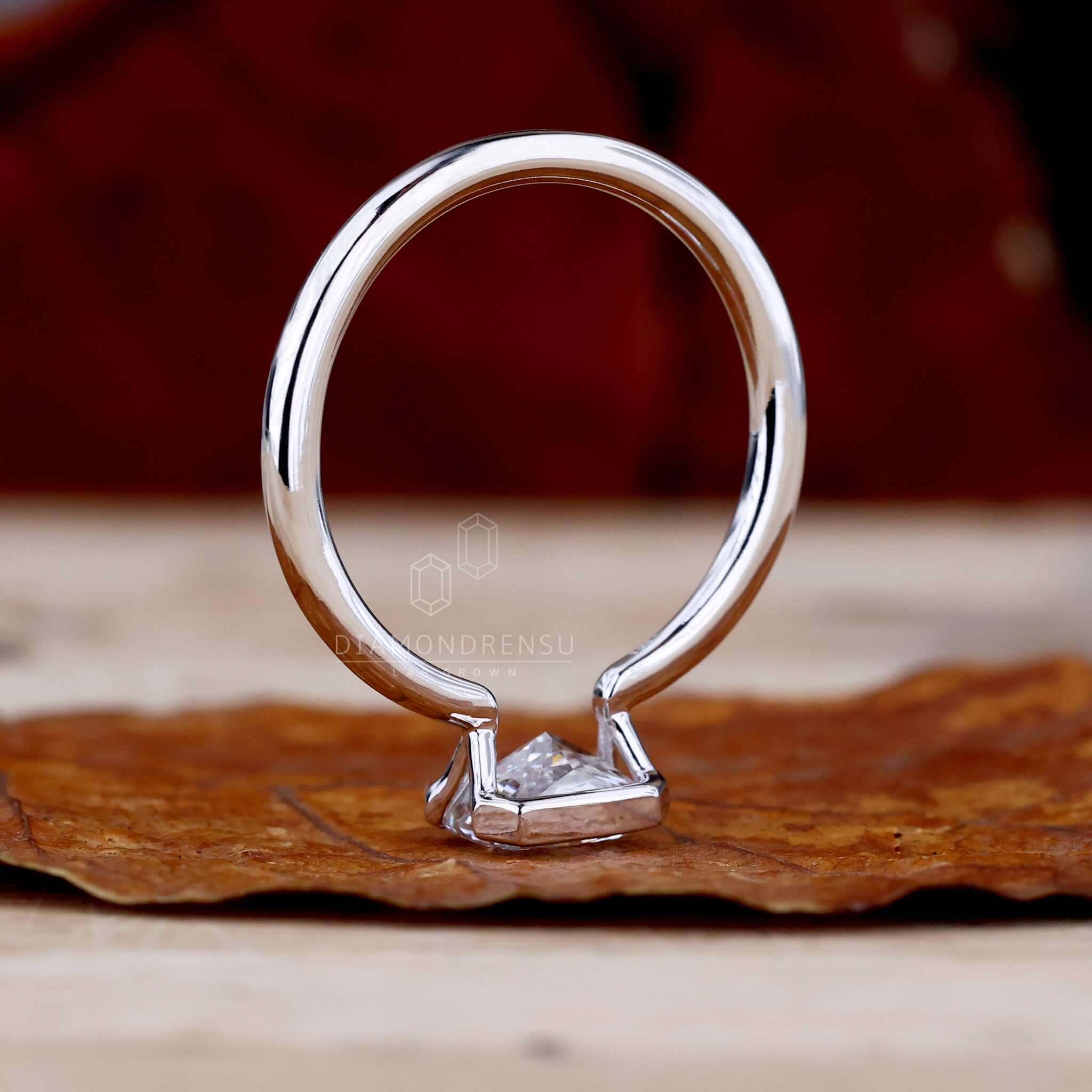 1.01 CT Radiant Cut Lab Grown Diamond Ring, Half Bezel East to West Setting