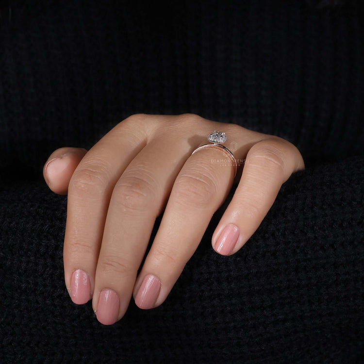 Diamond ring UK featuring a radiant engagement ring with a stunning halo ring ring for modern brides.
