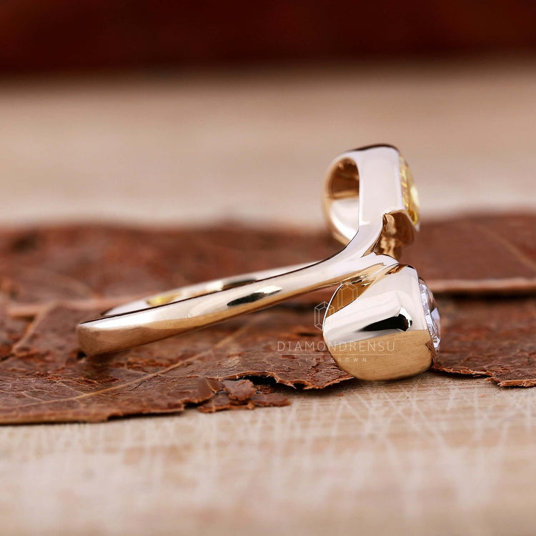 Sophisticated pear cut diamond engagement ring for women.