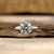 4 prong diamond ring showcasing a round brilliant cut diamond
