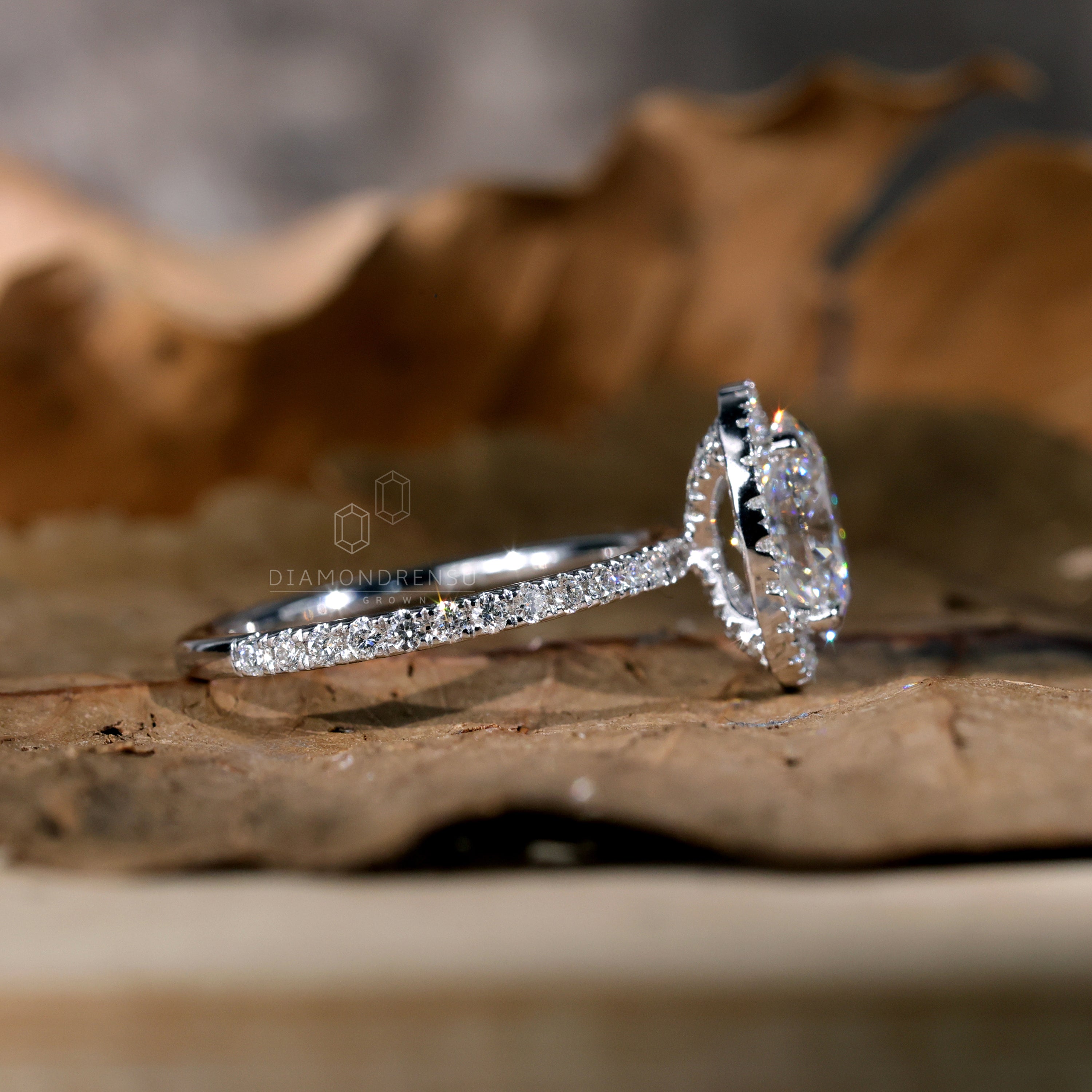 Oval Halo Engagement Ring designed for a sophisticated and classic look.