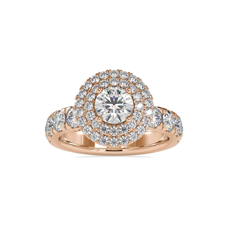 UK engagement ring with round halo and round diamond centre.
