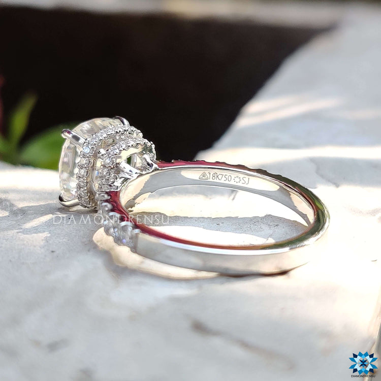Handmade cushion cut moissanite ring.
