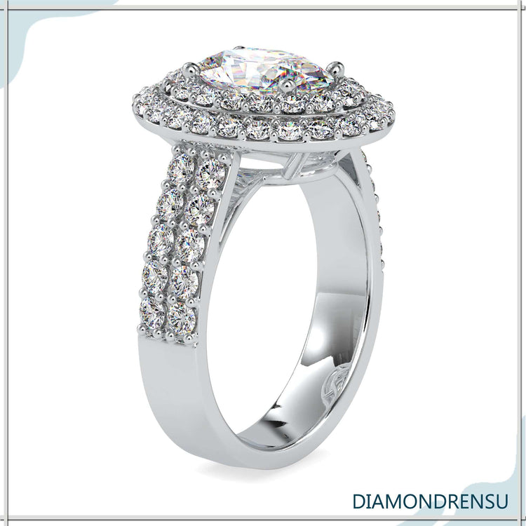 Diamondrensu UK engagement ring with double halo and prong setting.
