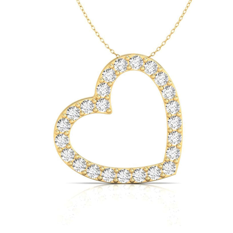 Gold heart pendant with round cut diamond in prong setting.
