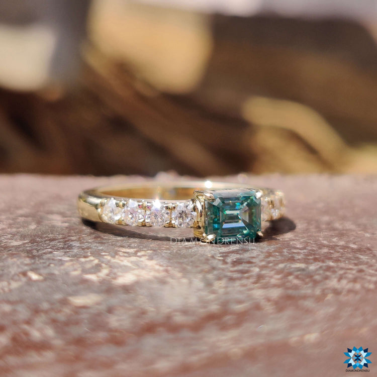 Round cut pave ring with yellow gold band.
