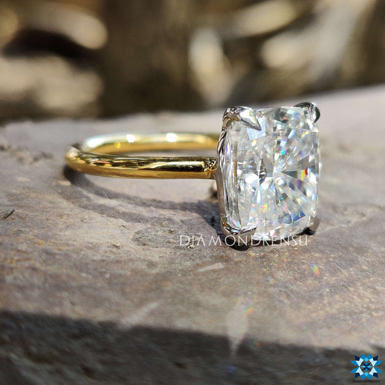 Handmade moissanite ring with four prong setting.
