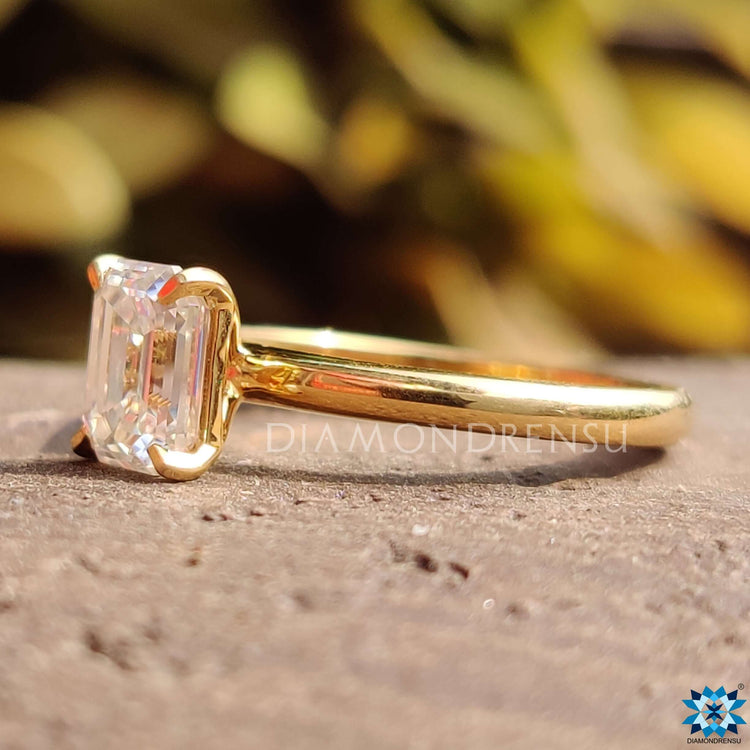 Handmade emerald moissanite ring.
