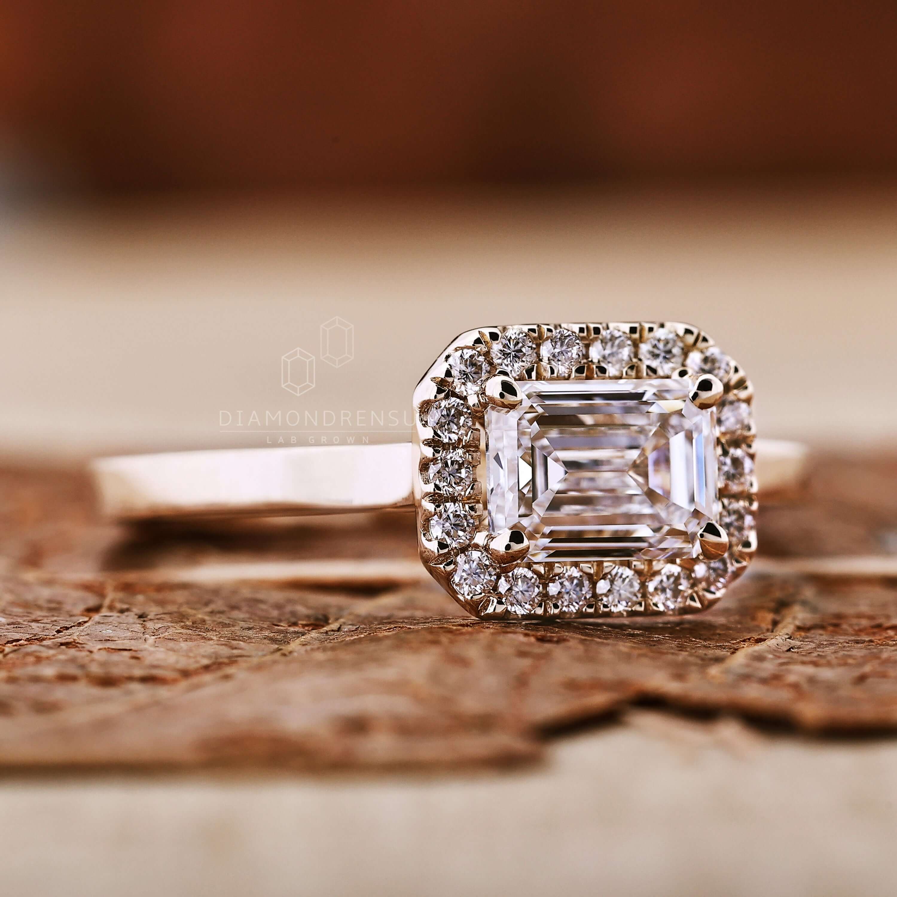 East west emerald cut ring with a Lab Grown Diamond for sustainability.
