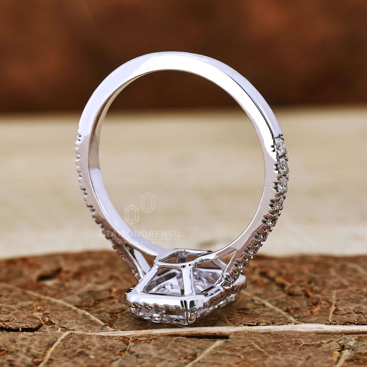 White gold engagement ring with pave accents for timeless elegance
