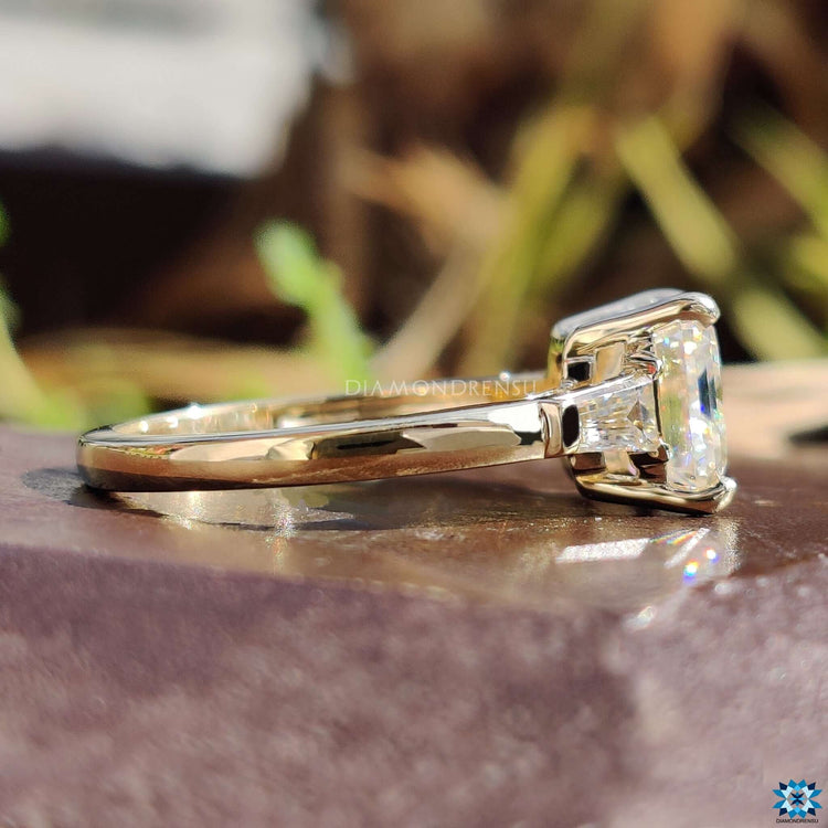Handmade three stone moissanite ring.
