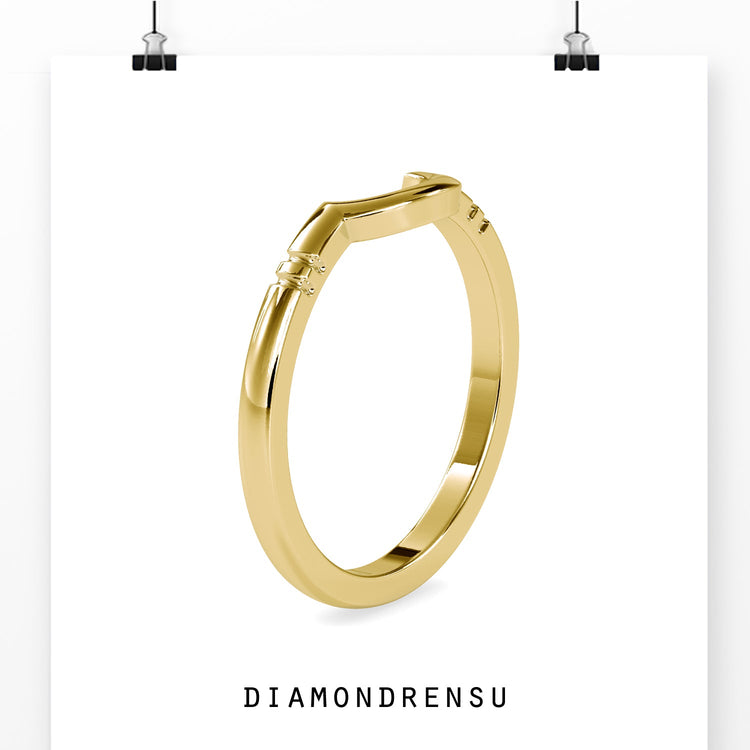 Contoured wedding band in rose gold with smooth finish.
