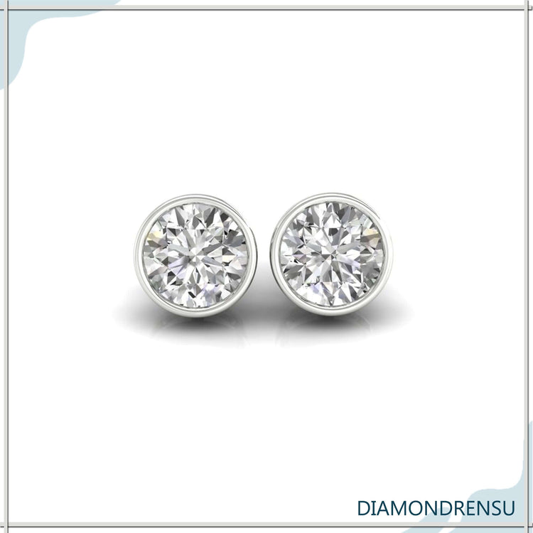 Bezel setting earrings with lab grown round diamonds.
