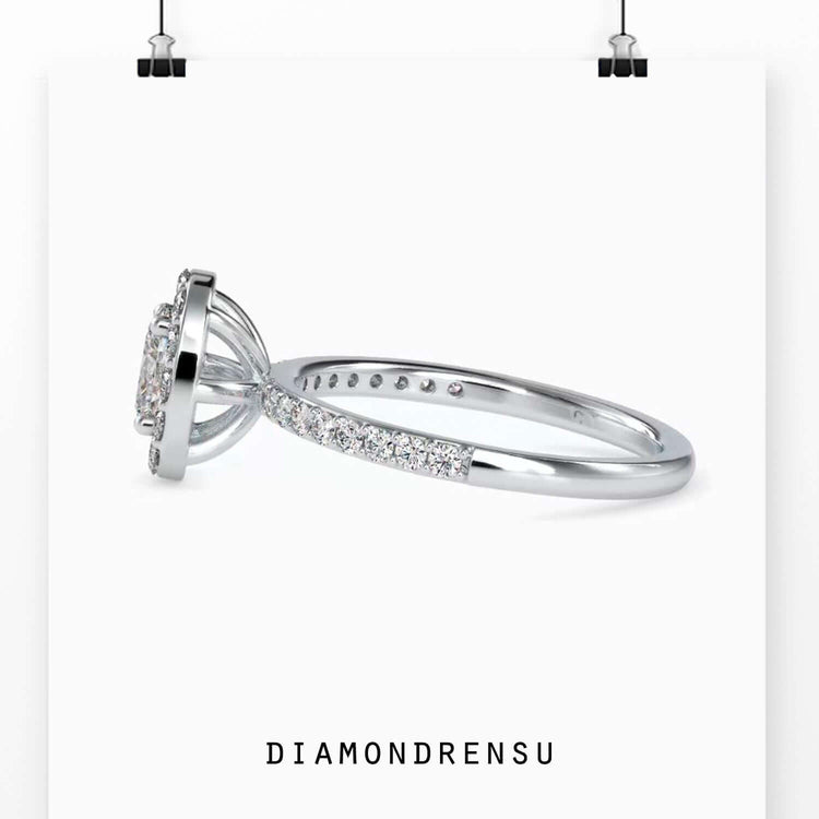 Pave band engagement ring with oval lab grown diamond.
