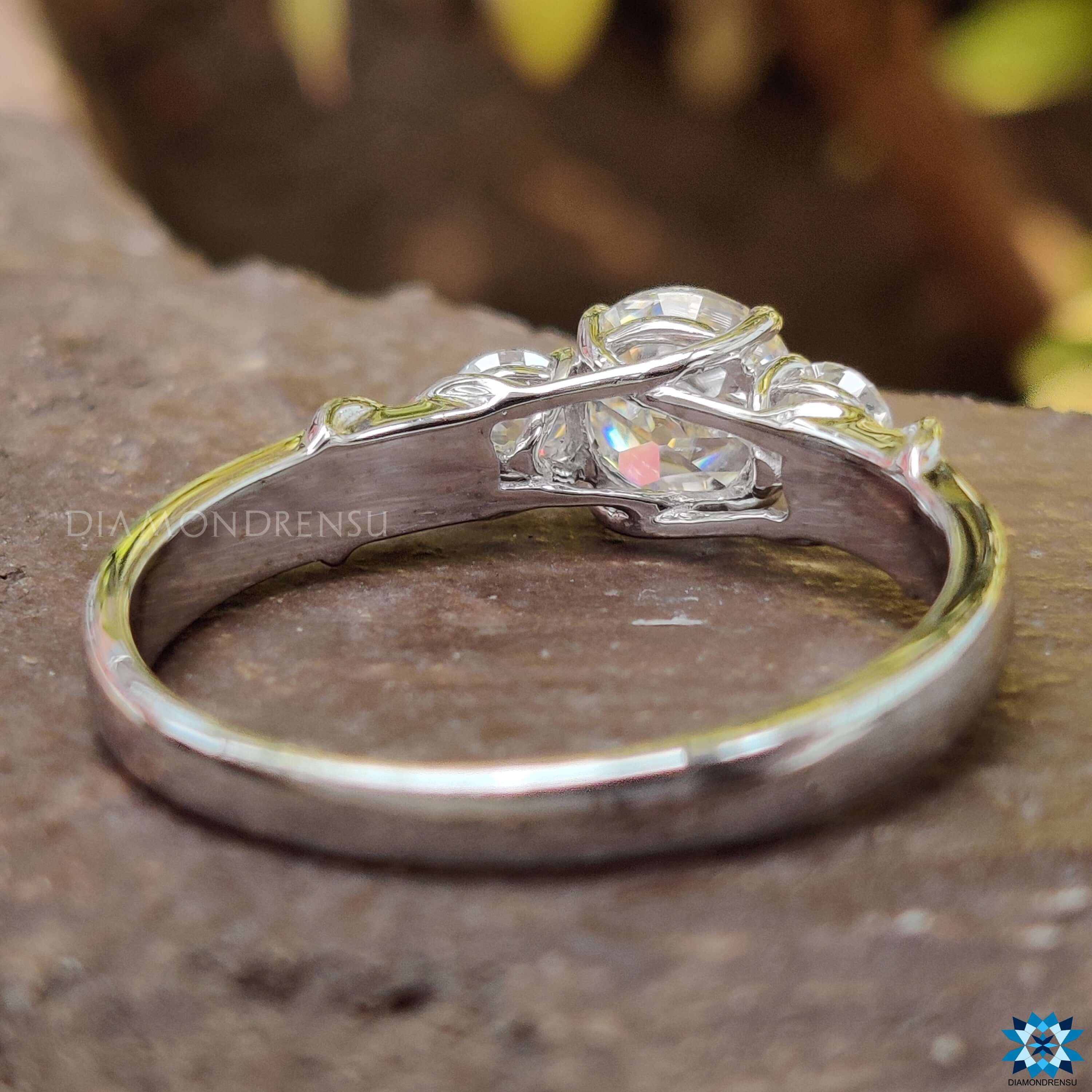 White gold ring with dazzling moissanite stones.
