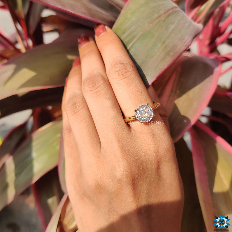 Custom engagement ring with Portuguese cut stone.
