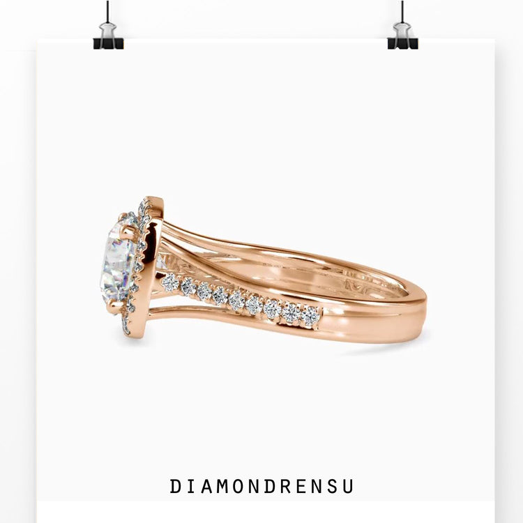 Rose gold engagement ring with pave diamonds and halo design.
