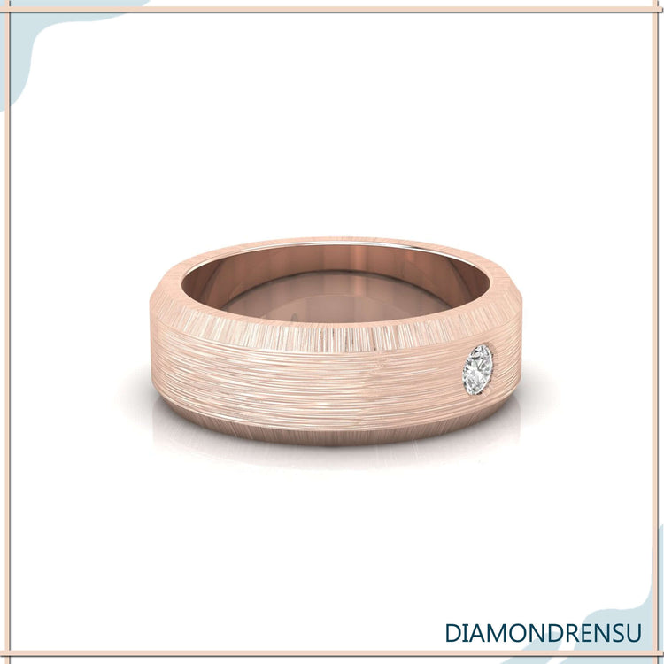 Diamondrensu UK wedding band with one round diamond band in rose gold.
