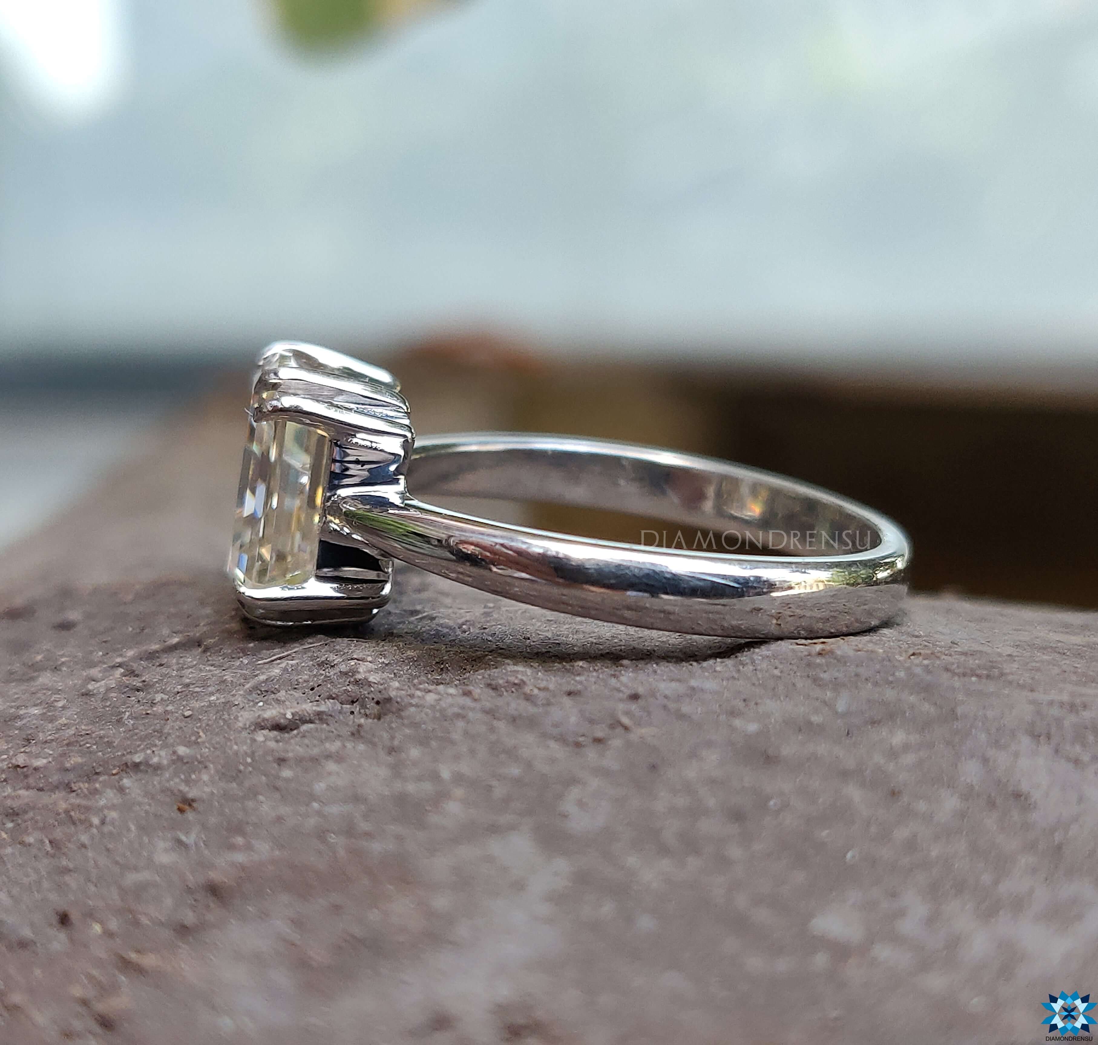 Double Prong Ring with Moissanite Stone.