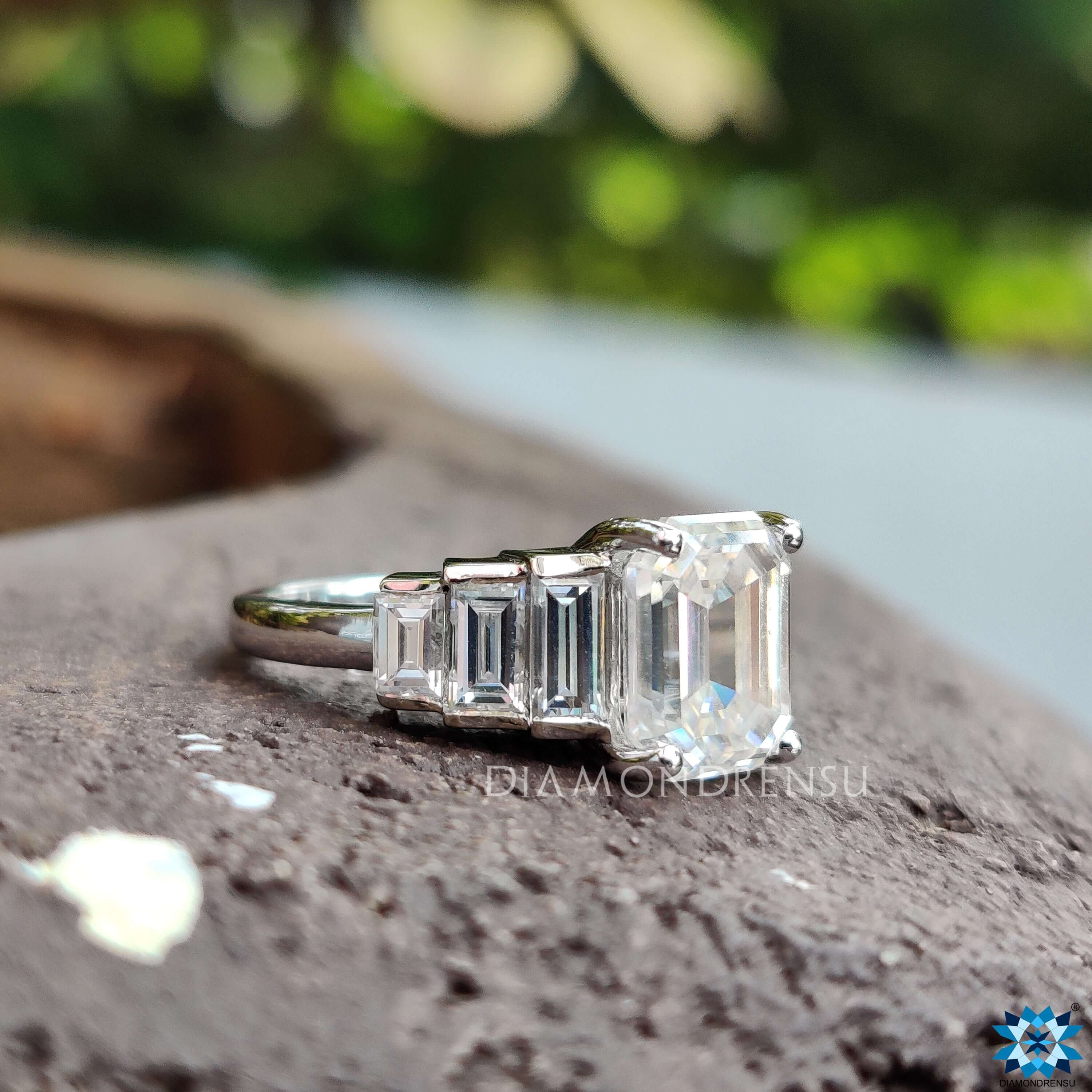 Emerald Cut Engagement Ring with Baguette Side Stones.