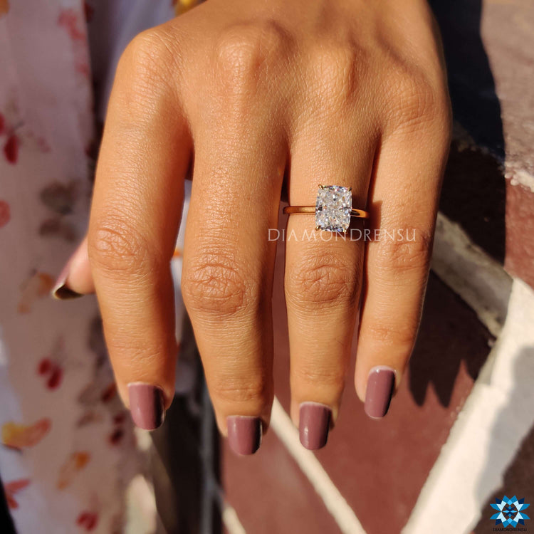 UK handmade engagement ring with a moissanite center stone.
