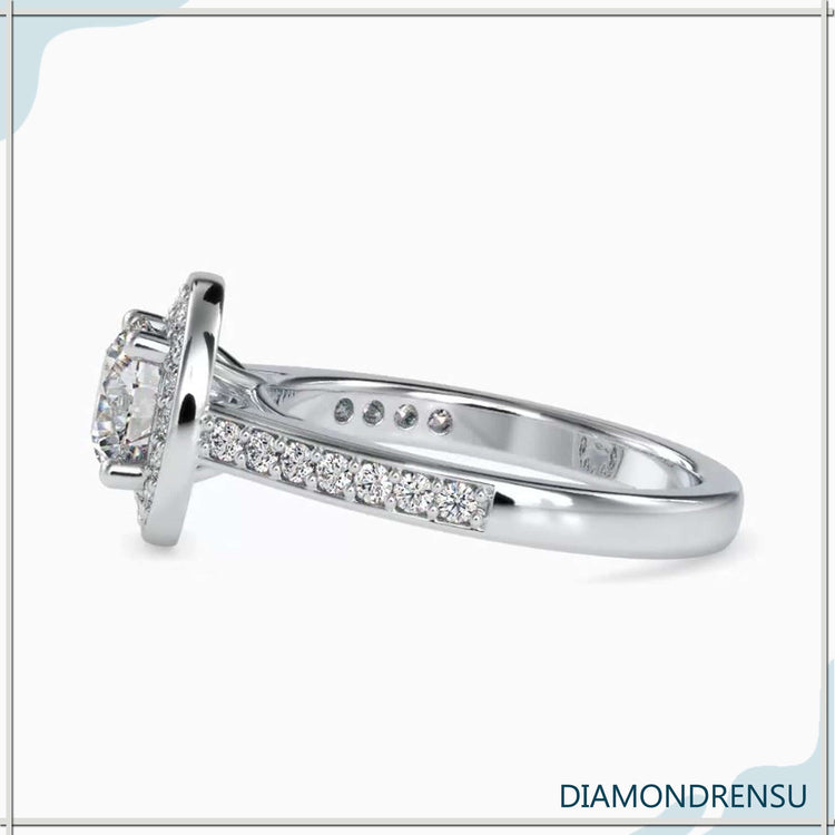 Buy engagement ring with round brilliant cut and pave setting.
