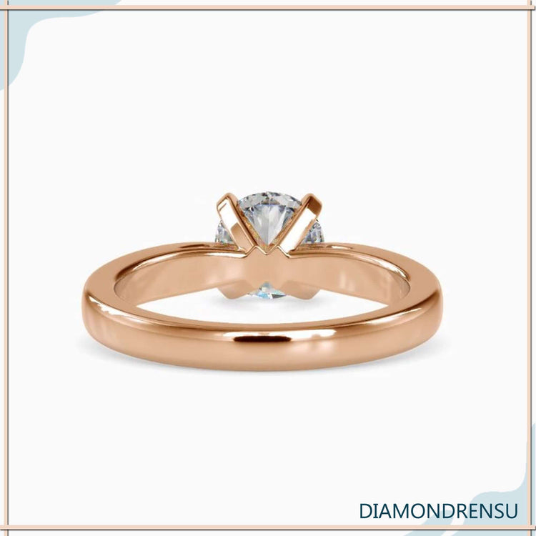 Simple diamond ring crafted in rose gold with handmade style.
