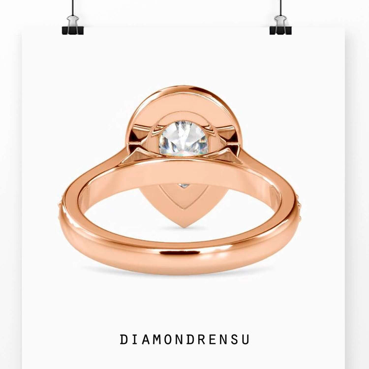 Handmade jewellery showcasing pear cut lab grown diamond.
