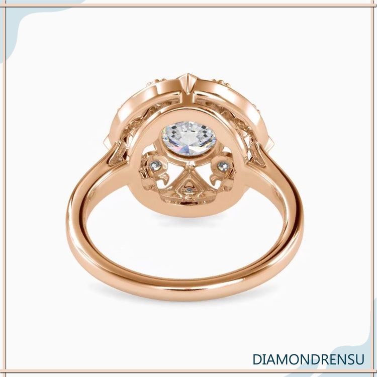 Rose gold ring with round cut lab diamond and antique finish.
