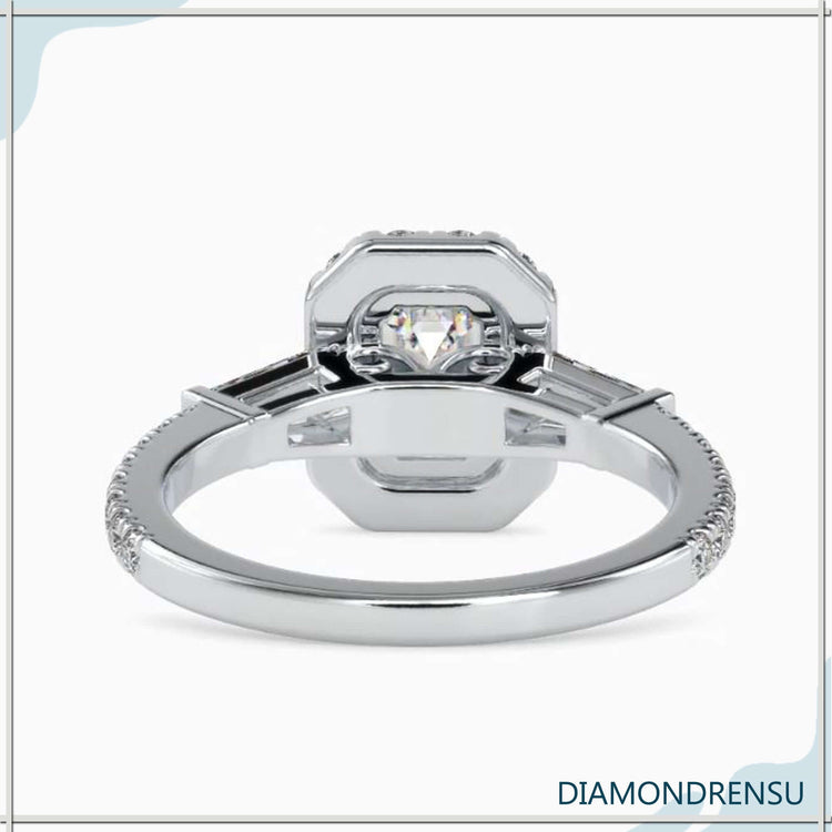 Engage ring UK with handmade three stone setting.
