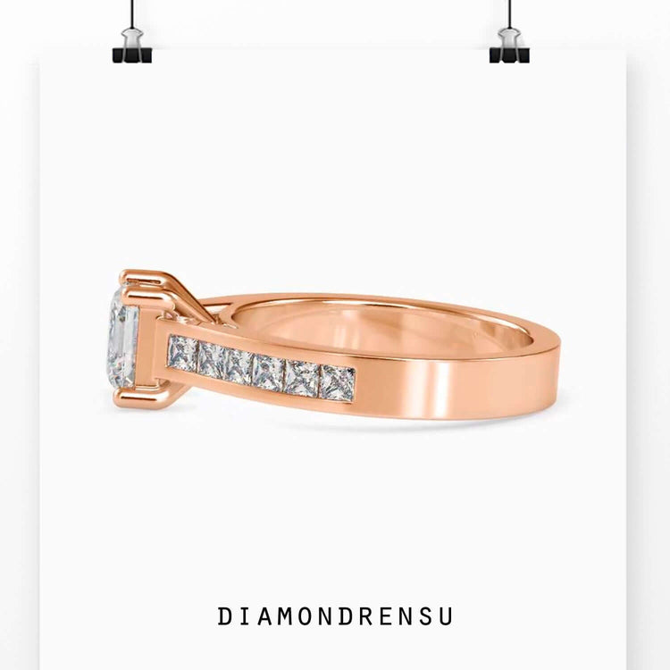 Yellow gold diamond ring with princess cut pave layout.
