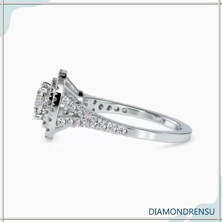 White gold double halo ring with round prong cushion setting.
