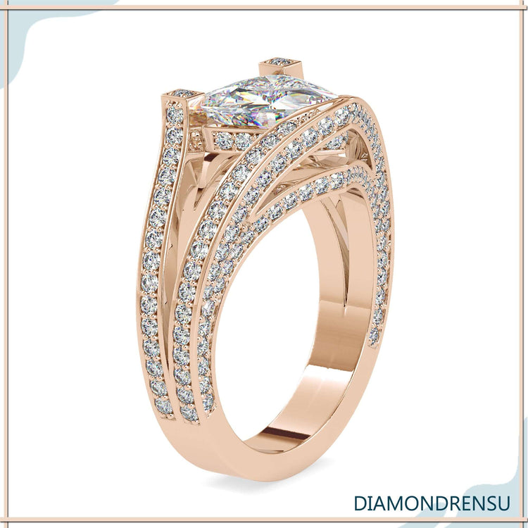 Buy engagement ring with trillion cut and pave band.
